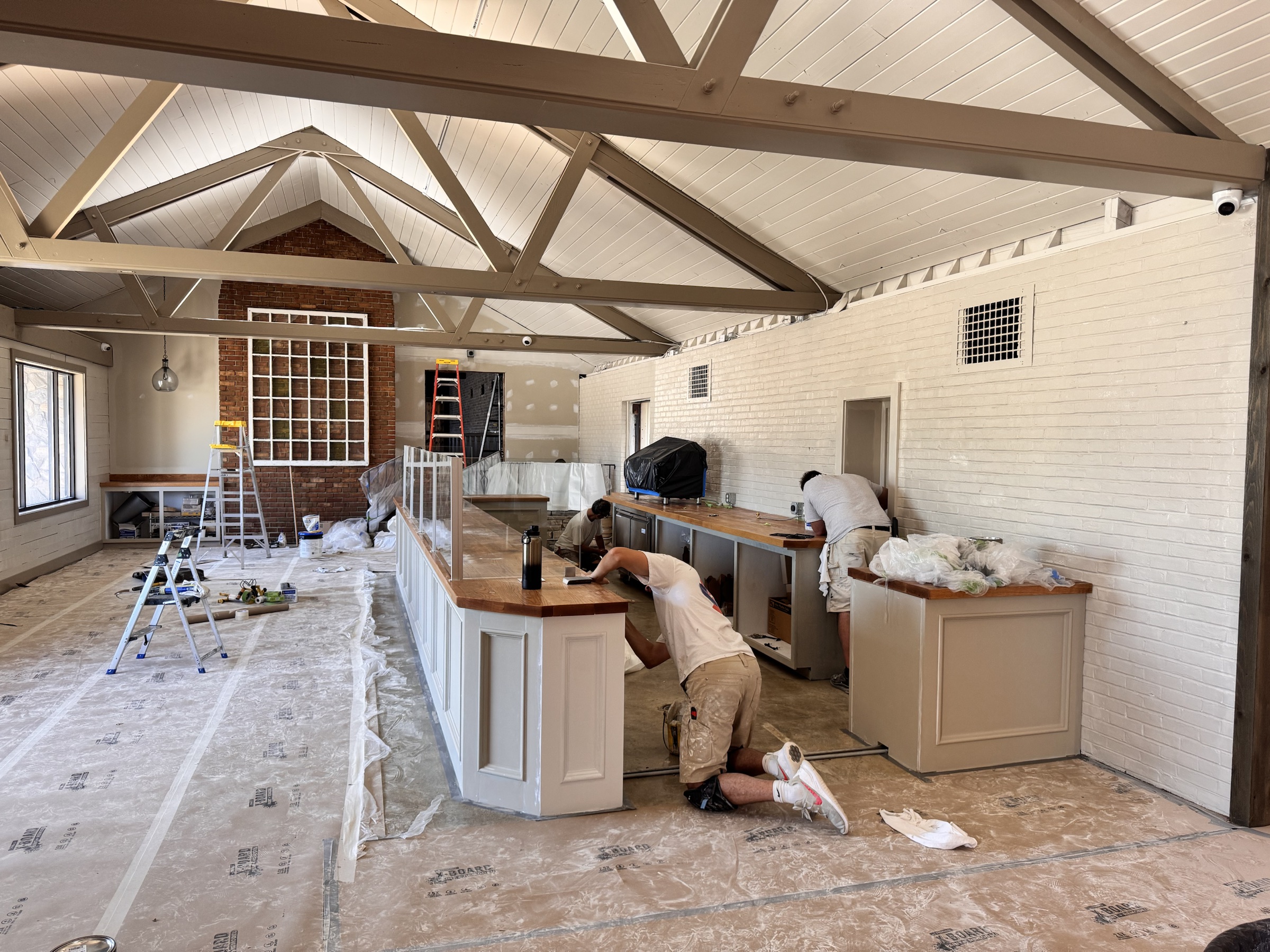 PaintRite crew working on a large commercial interior